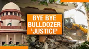 Bulldozer Justice and Arbitrary Demolitions - New Orleans after Hurricane Katrina. Lower 9th Ward flood devastated residential neighborhood; Bulldozer working on fill in Industrial Canal levee breach looking north towards Florida Avenue Bridge.