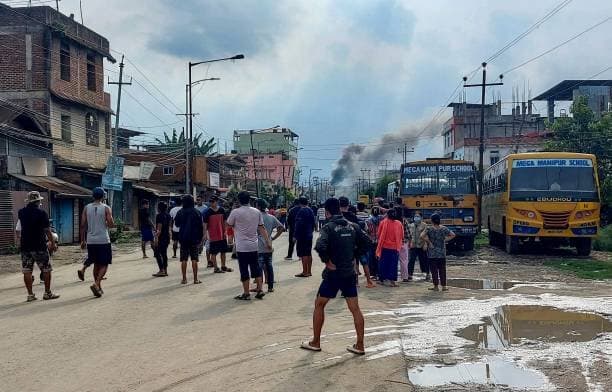 Manipur Violence - Street smoke and civilian-area disruption visual from the CWI local archive.